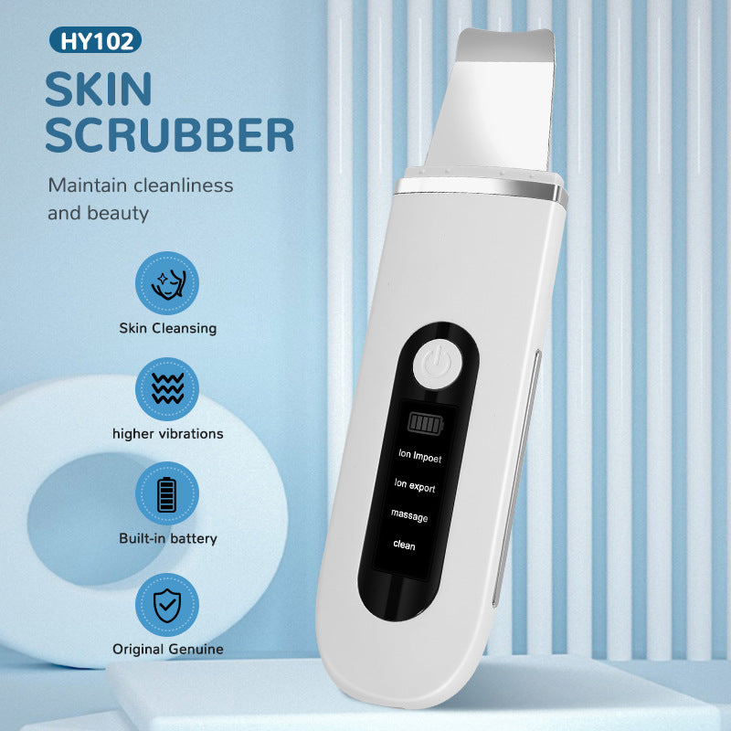 Facial skin scrubber spatula head close-up